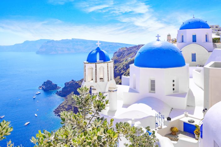 Beautiful Oia town on Santorini island, Greece. Traditional whit